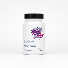 Bottle of Bluegrass Precision Wellness Women’s Probiotic dietary supplement with 30 capsules on a white background.