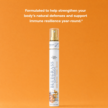 Bluegrass Supplements bottle on an orange background with text about immune support.