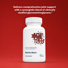 White supplement bottle labeled 'Bluegrass Supplements Mobility Matrix' on a red background with text about joint support.