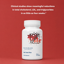 White supplement bottle with red and black design on a red background, featuring text about cholesterol reduction.