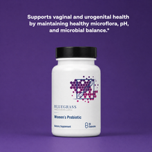 White probiotic supplement bottle with black cap on a purple background, featuring text about vaginal and urogenital health.