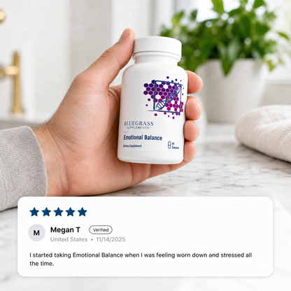 Hand holding a bottle labeled 'Emotional Balance' with a product review overlay.