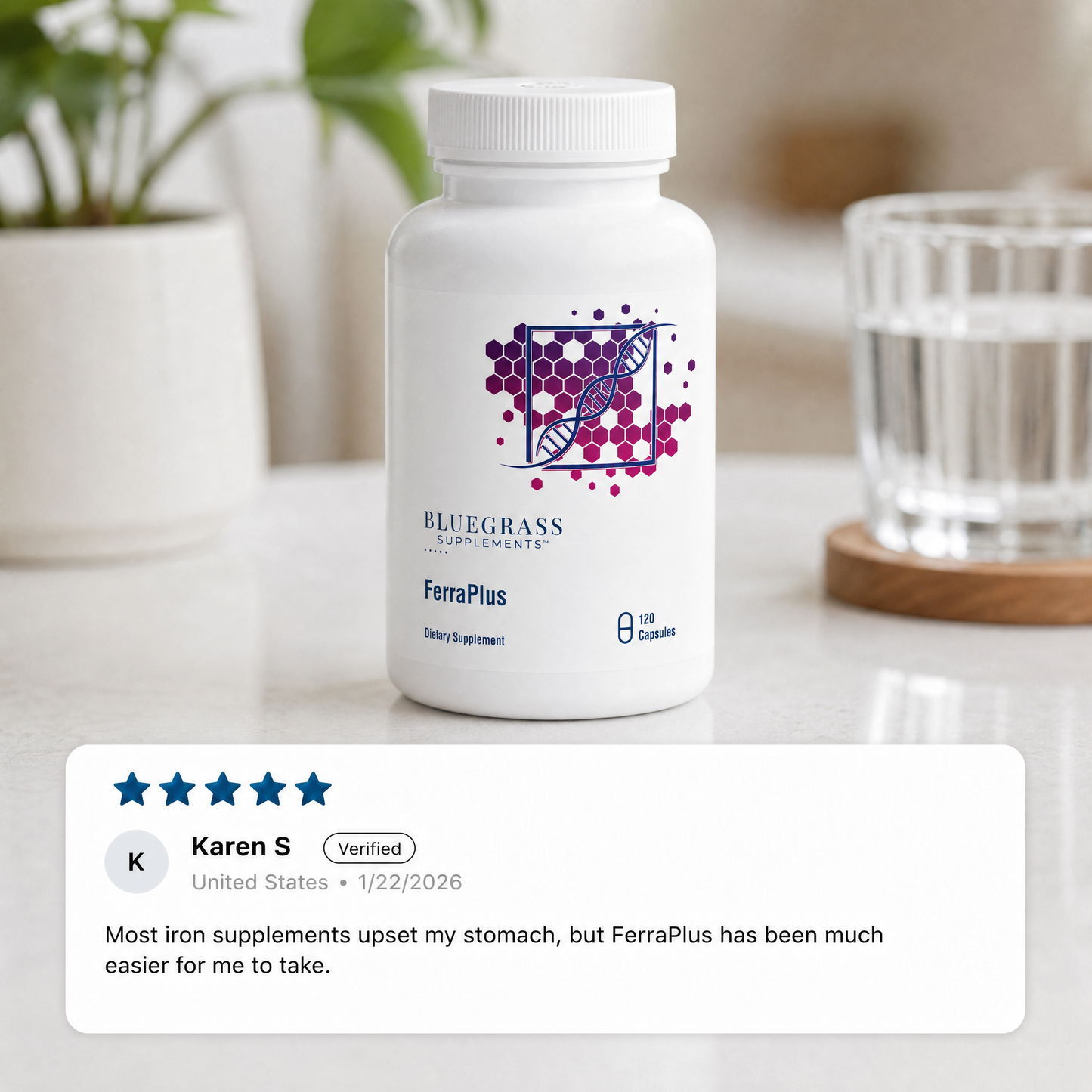 Supplement bottle labeled 'FerraPlus' by Bluegrass Supplements on a table with a customer review displayed.