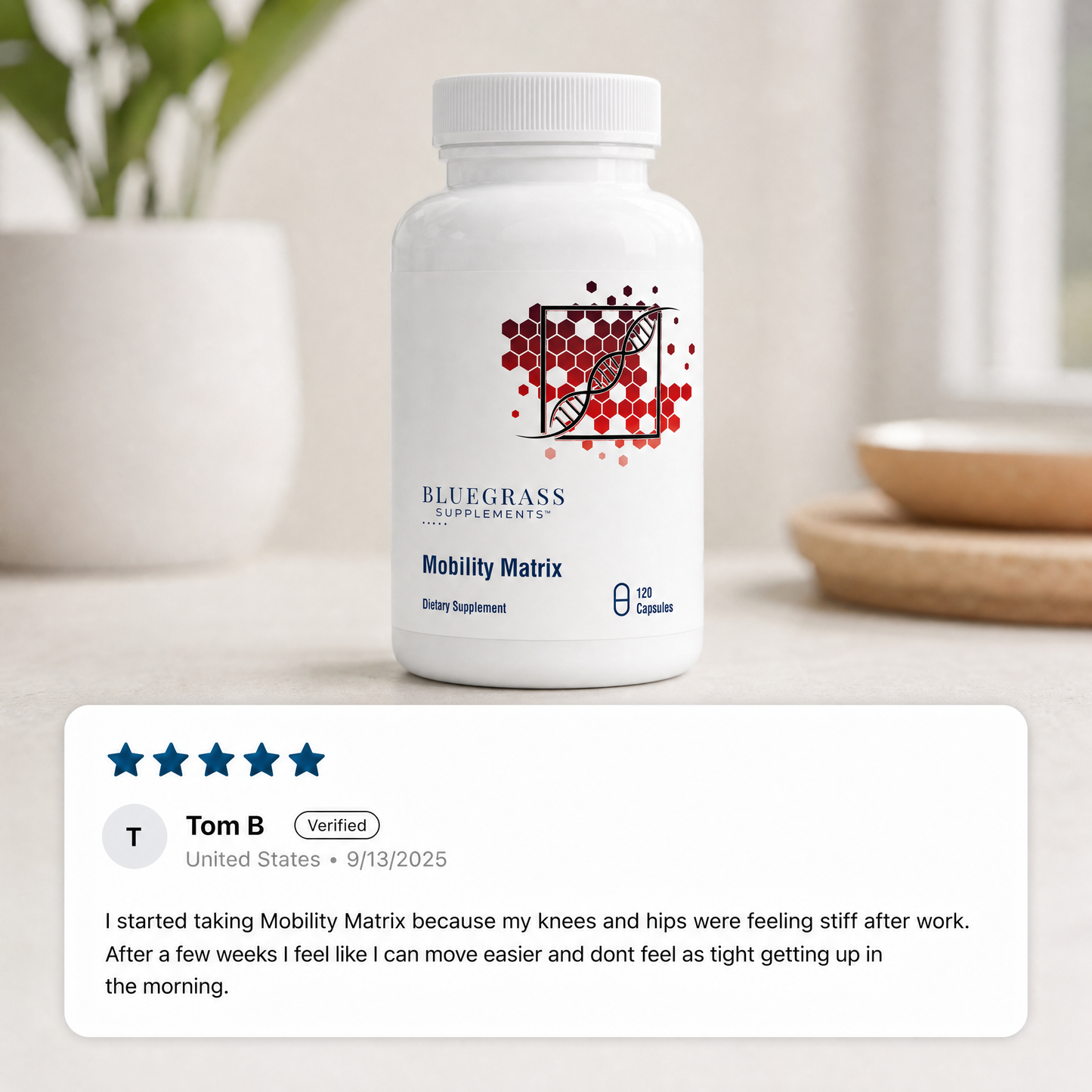 White supplement bottle labeled 'Bluegrass' with a five-star review from Tom B on a light background.