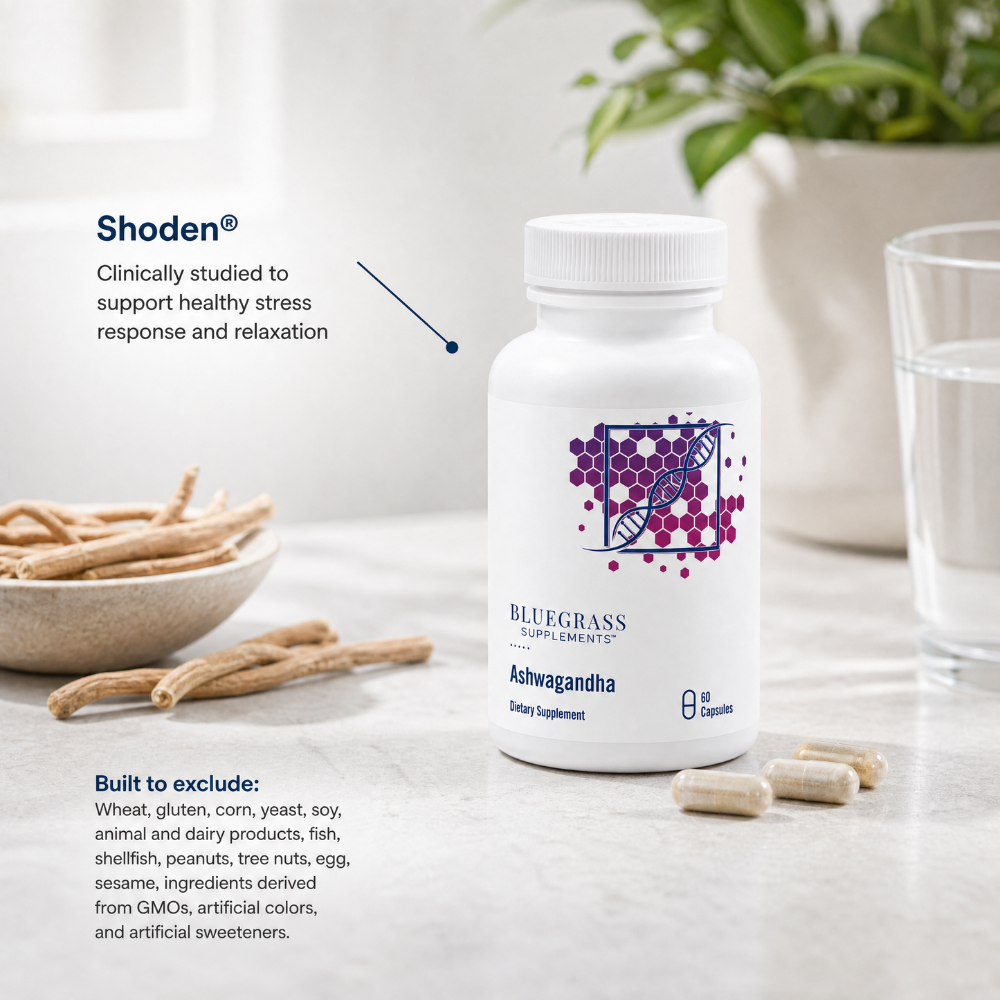 Supplement bottle labeled 'Bluegrass' with text about Shoden and Ashwagandha on a light surface.