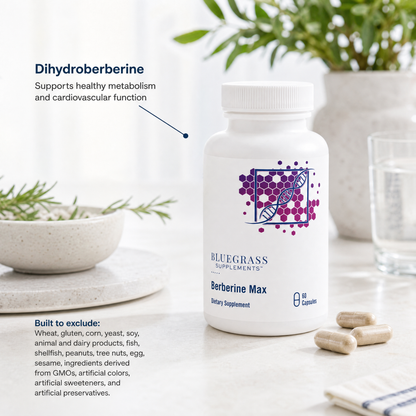 Bluegrass Supplements Berberine Max dietary supplement bottle on a light surface with plants in the background.
