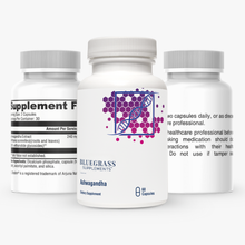 Three supplement bottles with labels on a white background. 