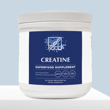 Creatine supplement container with blue label on a light blue background