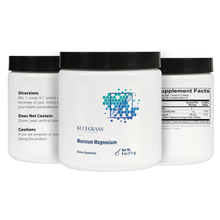 Three white supplement containers with black lids on a white background.