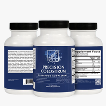 Three bottles of Precision Colostrum supplement on a white background.