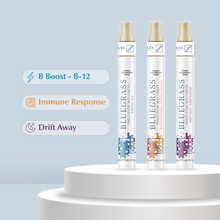 Three wellness spray bottles labeled B Boost - B-12, Immune Response, and Drift Away, presented on a circular platform against a blue background.