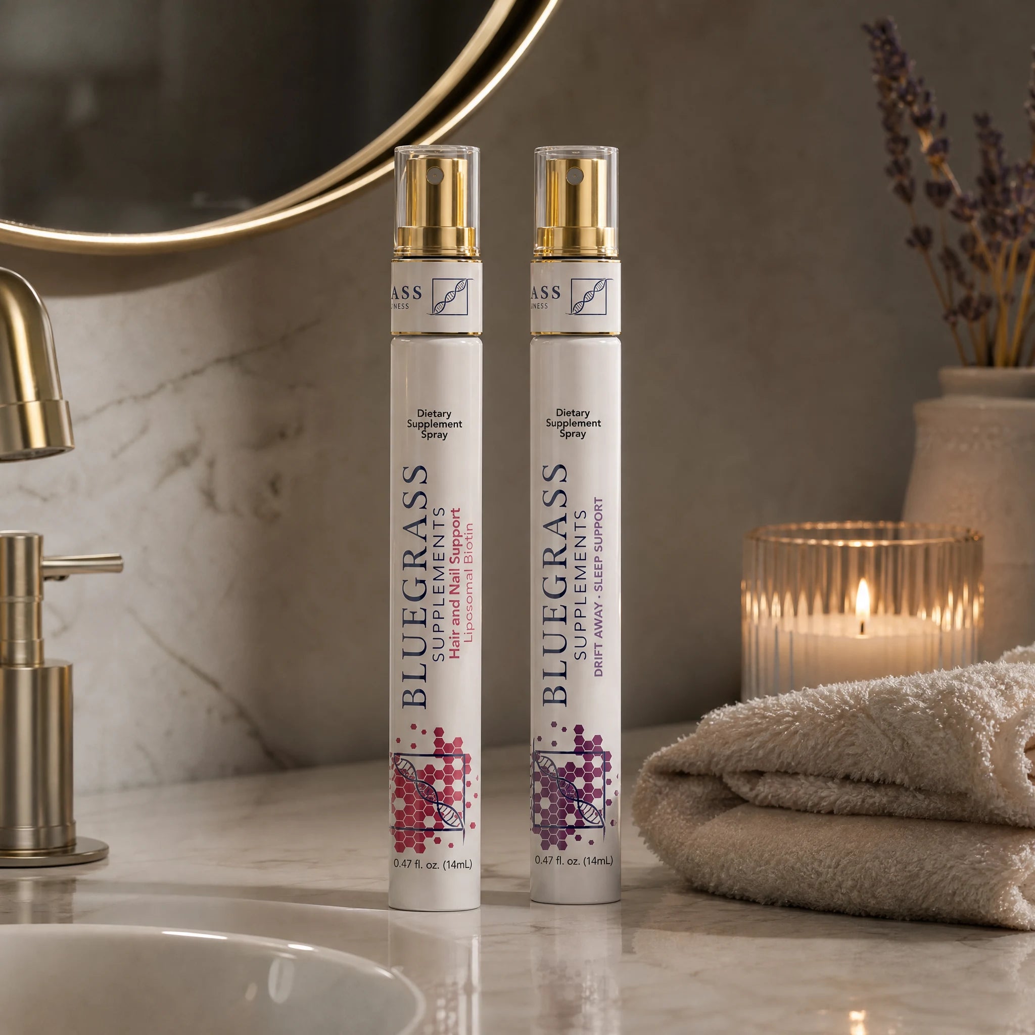 Hair and Nail Support and Drift Away sprays beside a candle in a softly lit bathroom